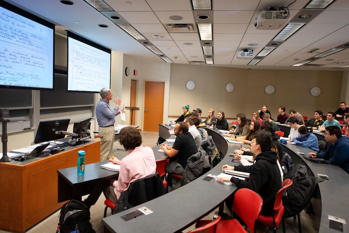 Students in a lecture hall taking an Intro to Biochemical Engineering course