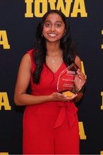 Shreya Kulkarni holding her Engineer and Something More award