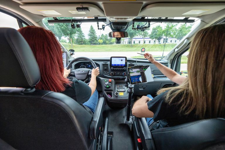 Staff members Cherie Roe and Cher Carney operate an automated Ford Transit for the ADS for Rural America project 
