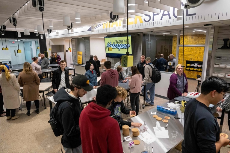 People looking around the Makerspace
