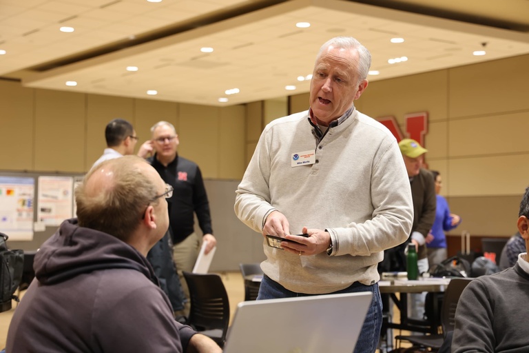 People talking at a conference