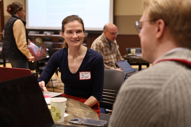 People talking at a conference