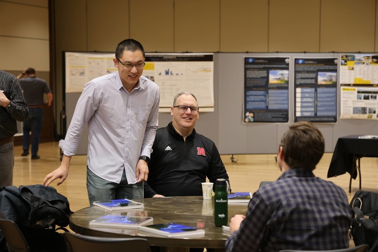 People talking at a conference