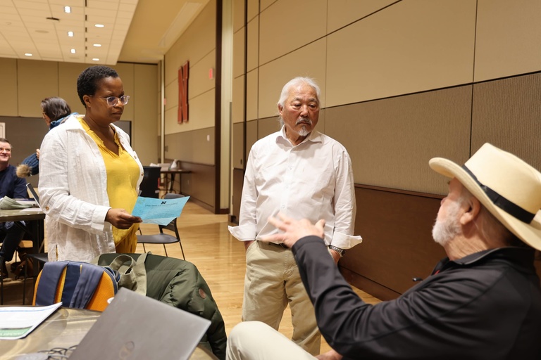 People talking at a conference