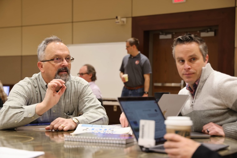 People talking at a conference