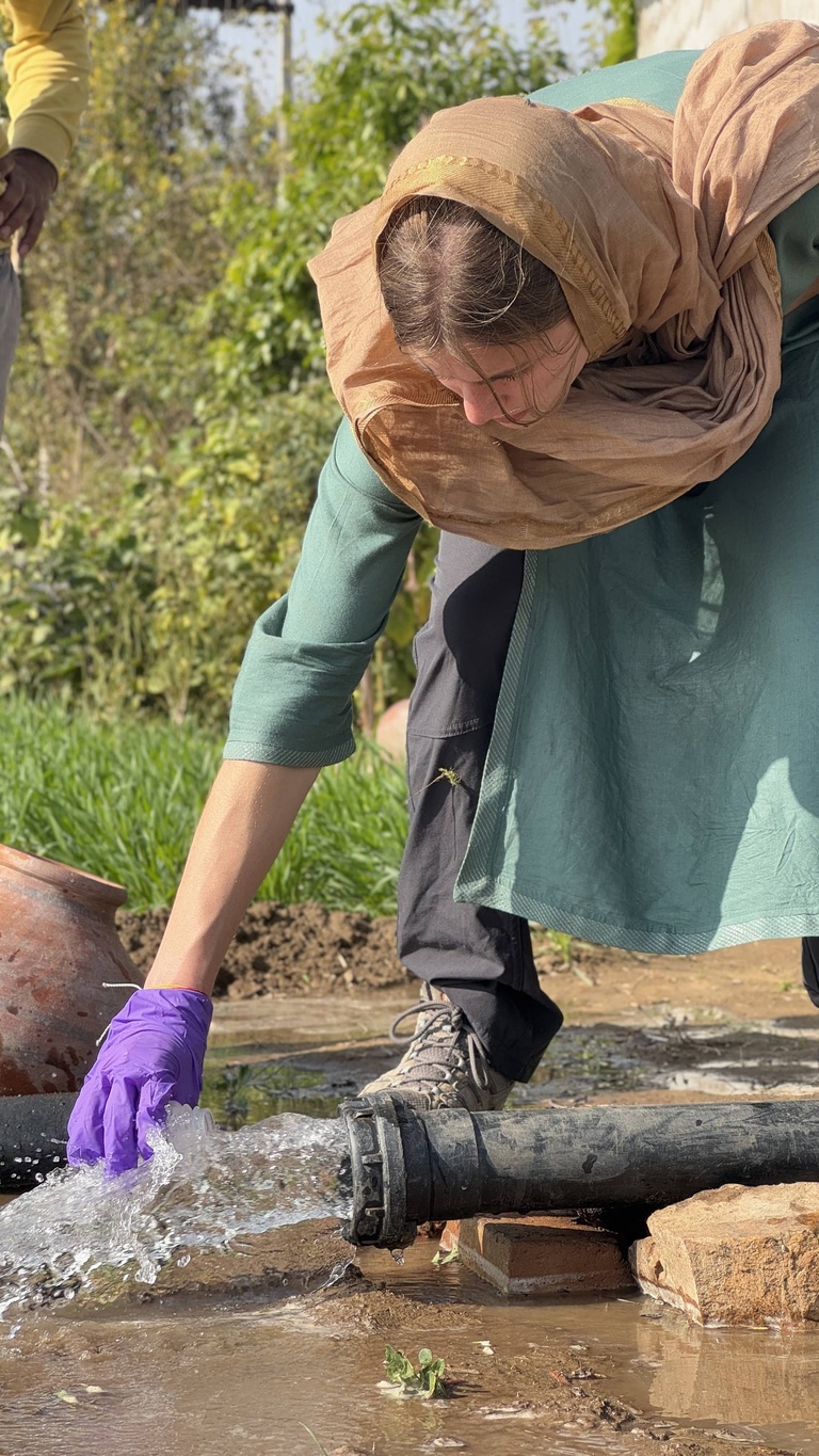 India Winterim student doing field work