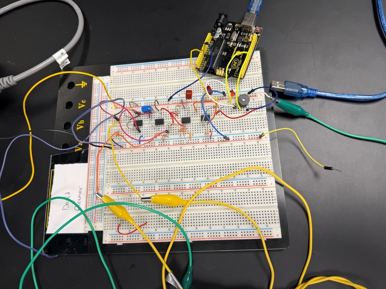 Close up of circuit board with multiple wires attached