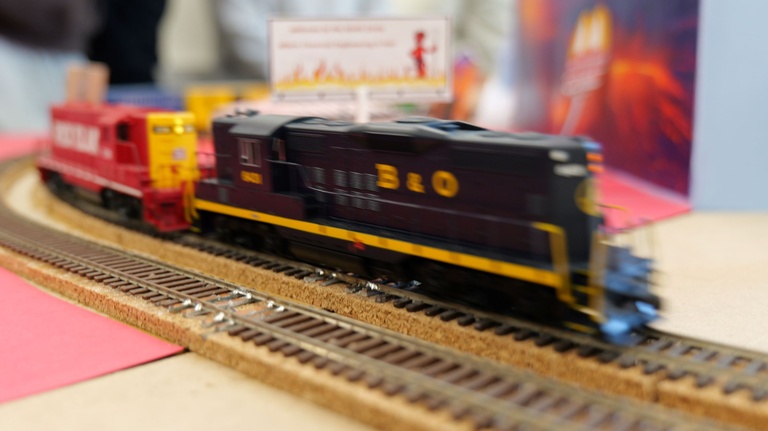 Model train moves across tracks