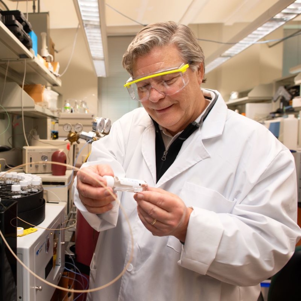 Jerald Schnoor works in his lab