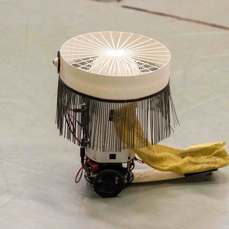Engineers designed robots that would be used during a dance performance at Hancher Auditorium. Researchers explore how the design and movement of the robots influenced the dancers.