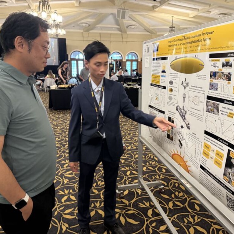 Leung discusses his team’s project at the Summer Undergraduate Research Festival.