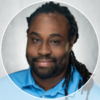 Man with blue shirt smiling
