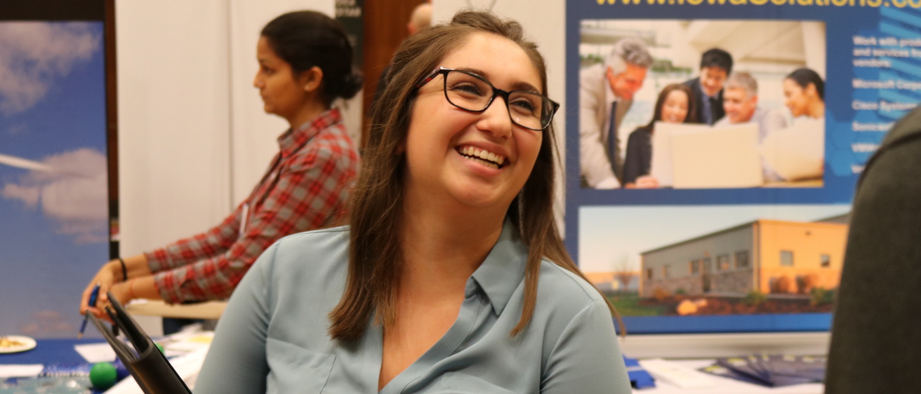 Photo of a woman smiling at the 2020 Engineering Career Fair