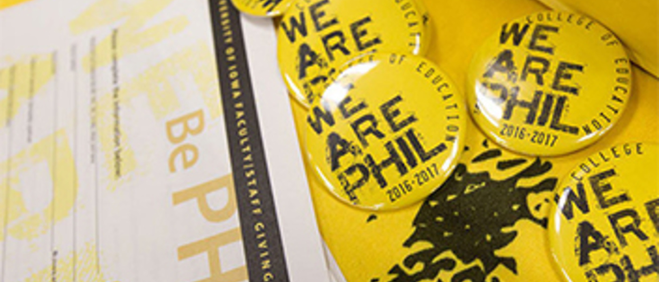 Five yellow pins that say, "We are Phil."
