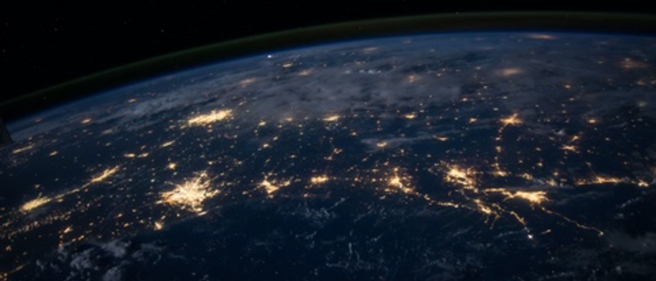 satellite image of the earth. lights from big cities can be seen from space