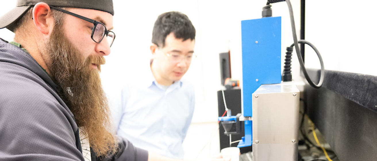 Bill Bangel PhD student and Xuan Song