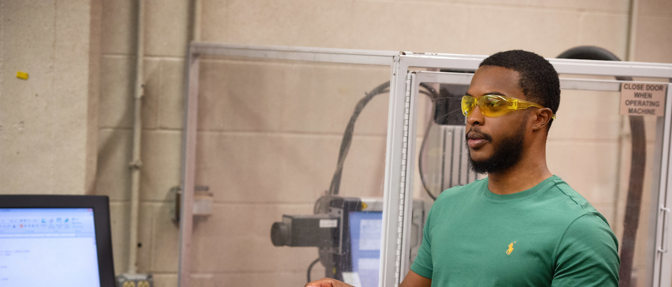 Graduate student Martell Bell works in the lab