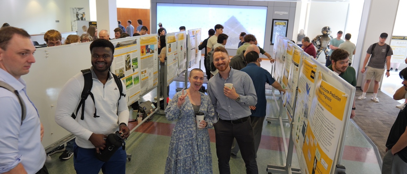 People discussing research posters