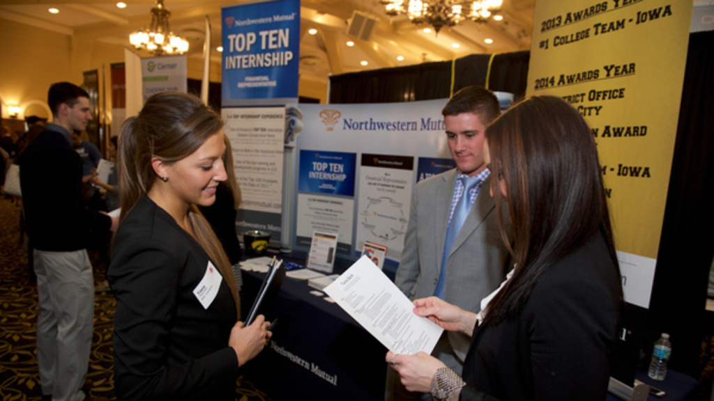 Student networking at career fair