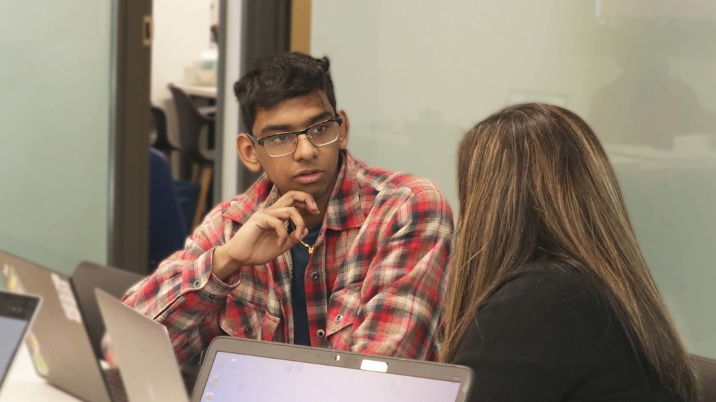 student talks to mentor 