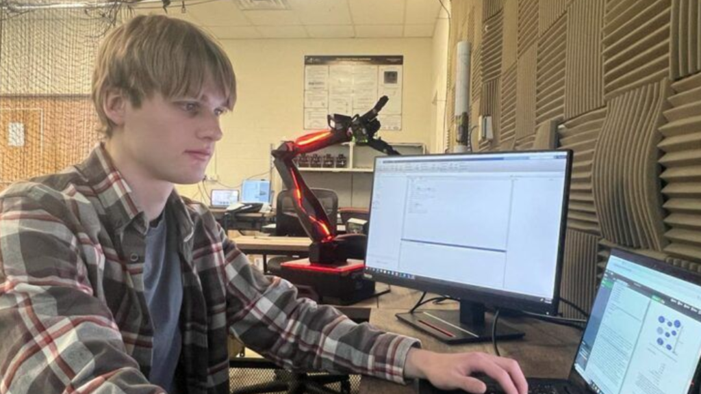 Maxwell Hammond working at a computer