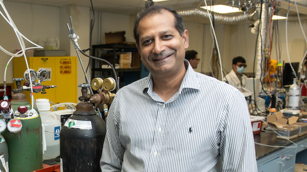 Suresh Raghavan poses for a photo in a lab